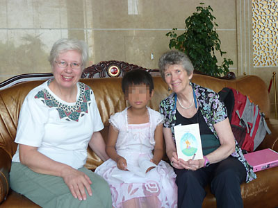 Judy and Linda visiting another of the orphans this project supports.